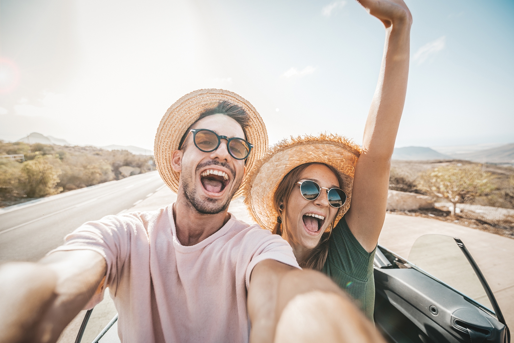 couple smiling after getting cosmetic dental procedures in Charlestown, NSW