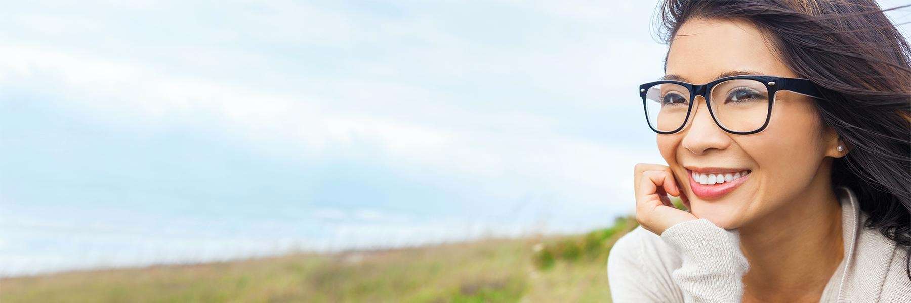 Woman smiling outside | Cosmetic Dentist Charlestown NSW
