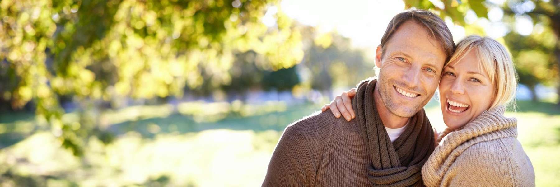 couple smiling in Charlestown | dental restoration