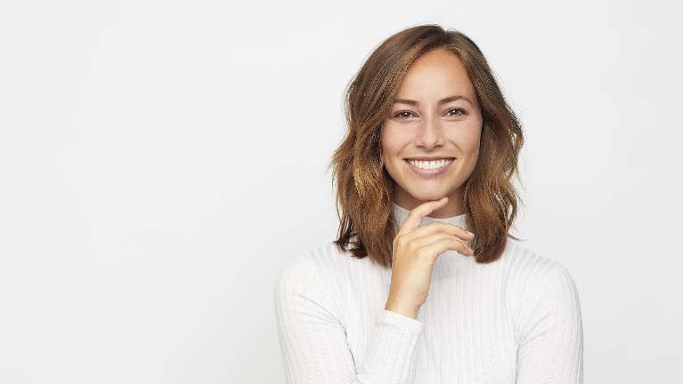 A woman smiling | Cosmetic Dentist in Charlestown NSW